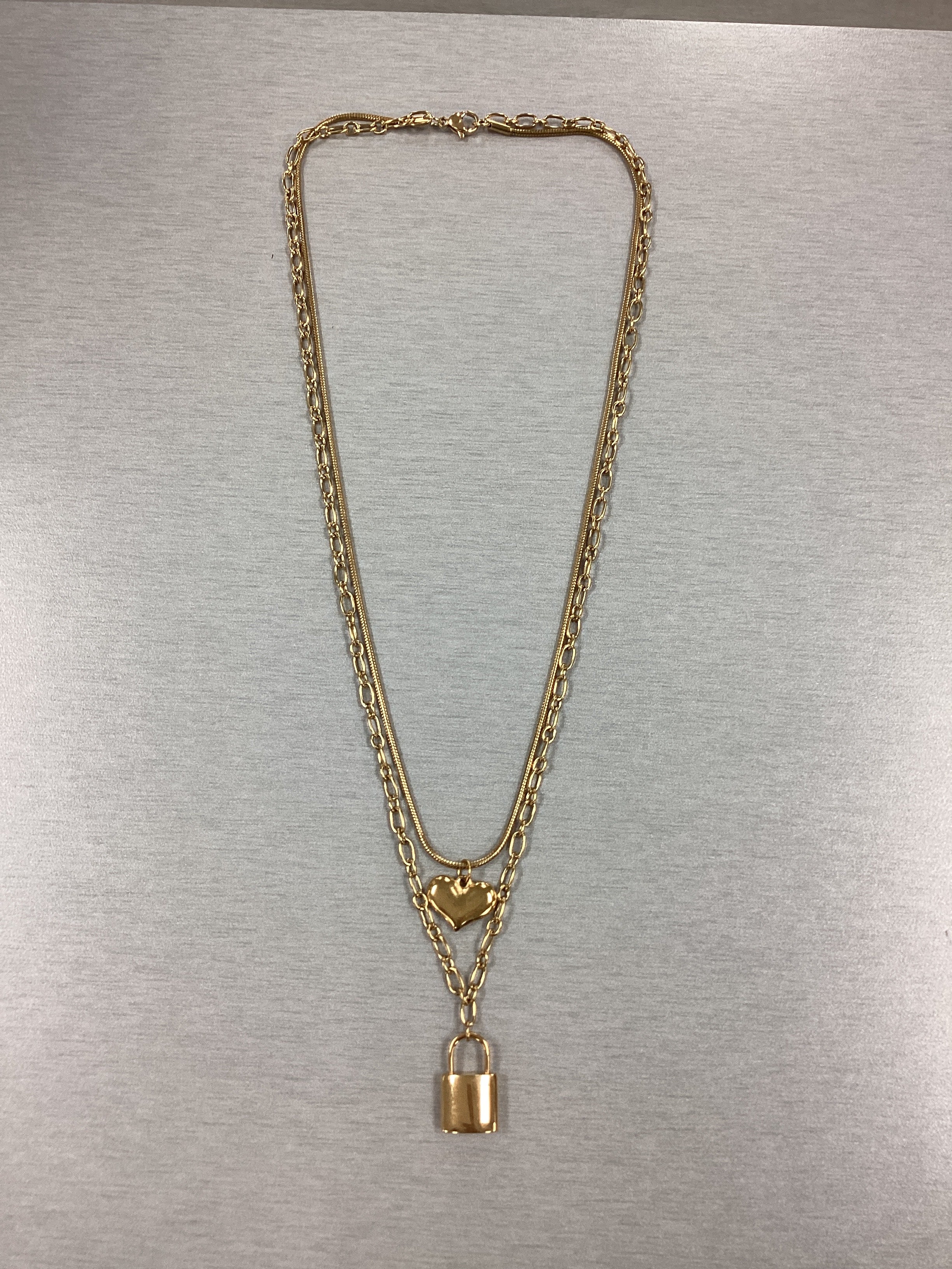 Layered Necklace With Heart And Lock Pendant