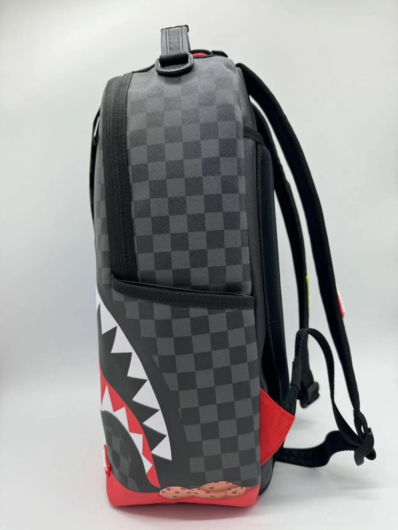 SPRAYGROUND - Sesame Street Cookie Monster Sneaking A Bite DLXSV Backpack