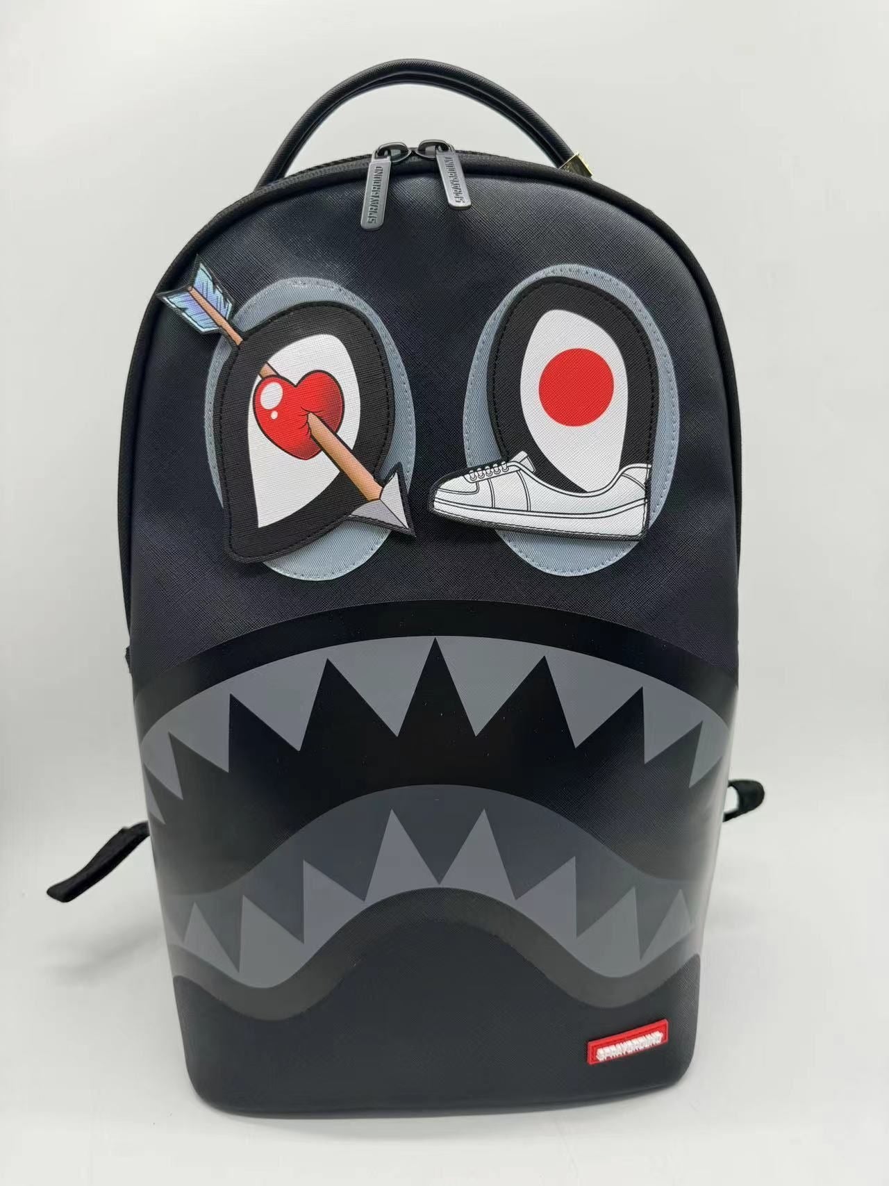 SPRAYGROUND - Black Removable Eyes DLXSV Backpack