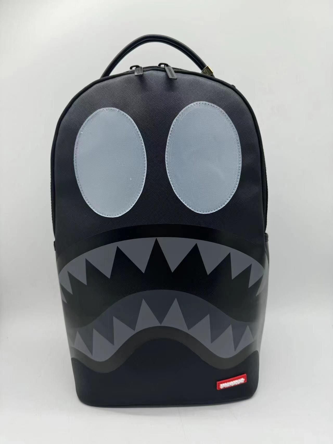 SPRAYGROUND - Black Removable Eyes DLXSV Backpack