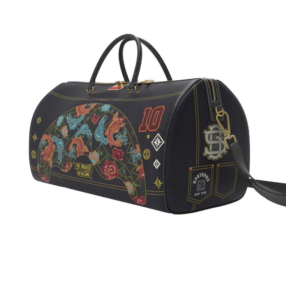 Black duffel bag with colorful designs and patches on a white background