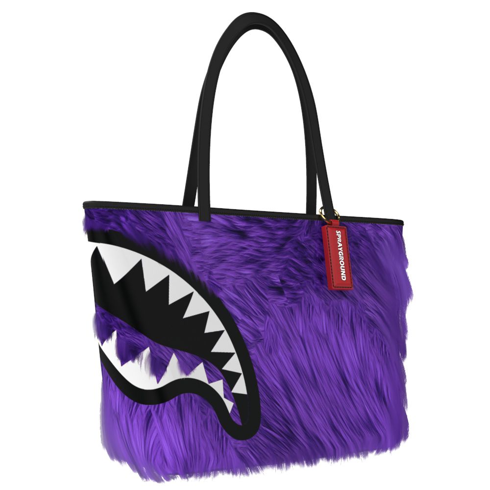 Purple furry tote bag with a shark mouth design on a white background
