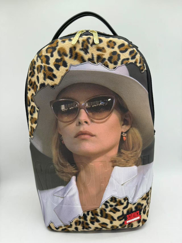Backpack with a design of a person wearing sunglasses and a hat with leopard print details.